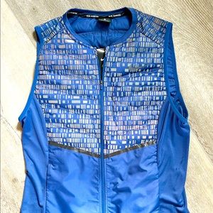 Nike Aeroloft women’s reflective vest, purple, size large, NWT!